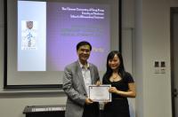 Prof. Christopher Cheng (left) presents certificate to a student completing the internship programme